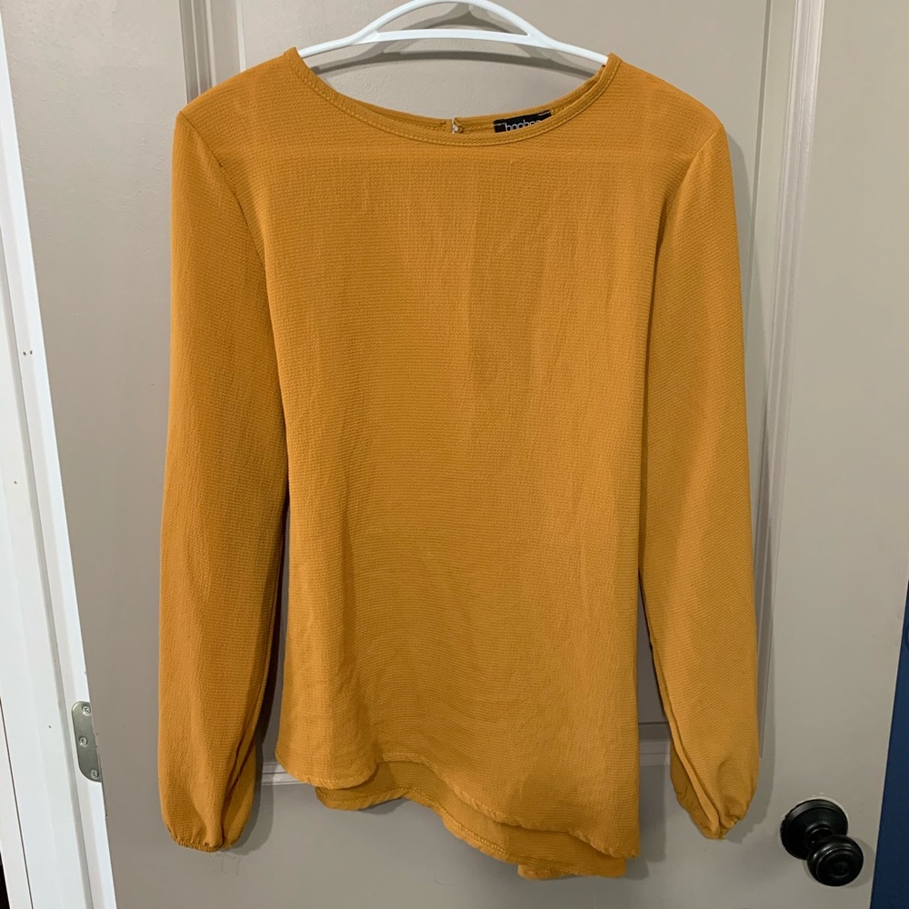 Ladies blouse with detailed back.